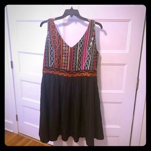 Embroidered dress with stretch smocked back